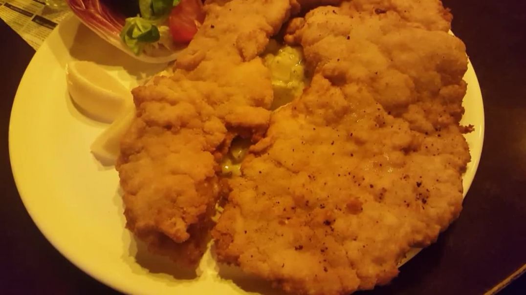 German Food_ Huge Portion Of Schnitzel